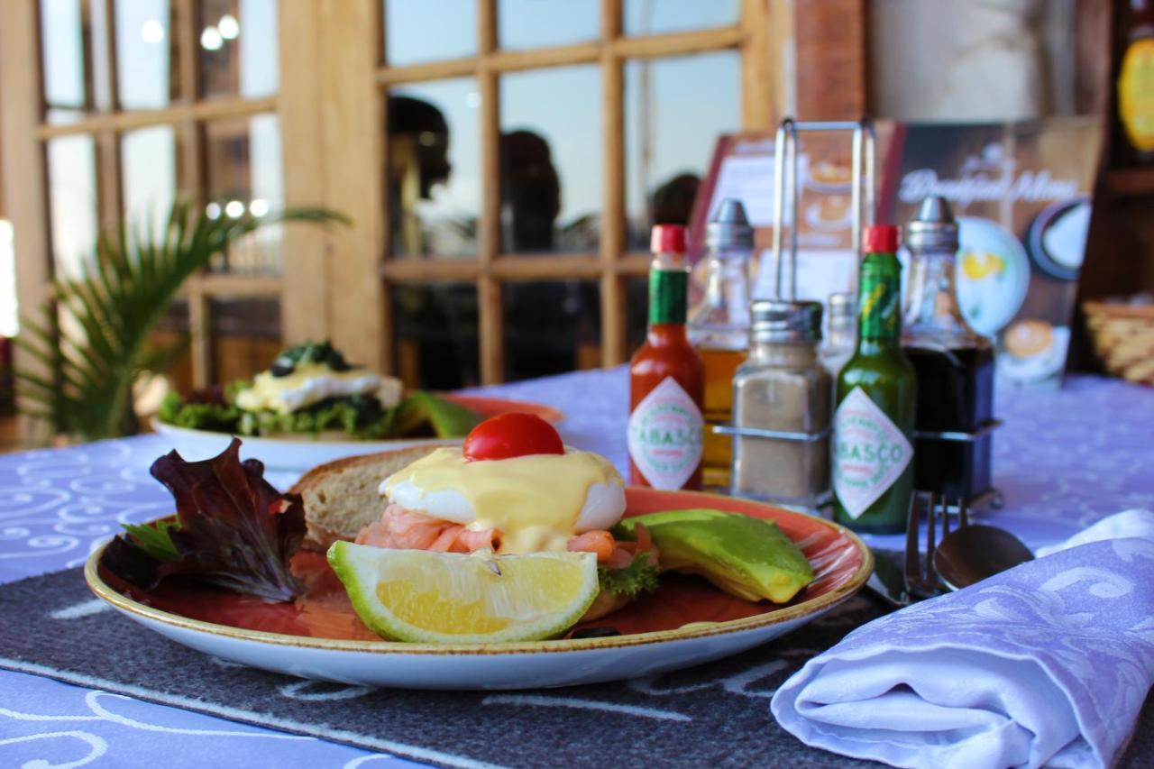The George Hotel Manzini Buitenkant foto